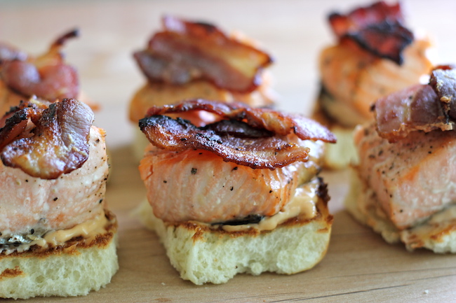 Salmon BLT Sliders with Chipotle Mayo - Loaded sliders with baked salmon and crisp bacon smothered in chipotle mayo.