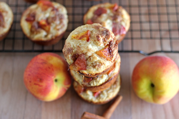 Peach Oatmeal Muffins - Wonderfully light and healthy, these cinnamon sugar crusted muffins are the perfect start to your mornings!