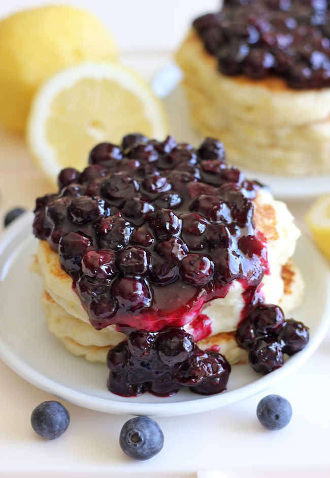 Lemon Ricotta Pancakes with Blueberry Sauce - Oh-so-light and fluffy pancakes made with 5-min homemade blueberry sauce. So much better than eating out!