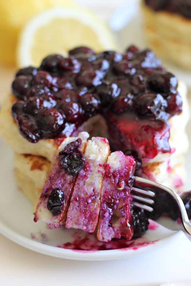 Lemon Ricotta Pancakes with Blueberry Sauce - Oh-so-light and fluffy pancakes made with 5-min homemade blueberry sauce. So much better than eating out!