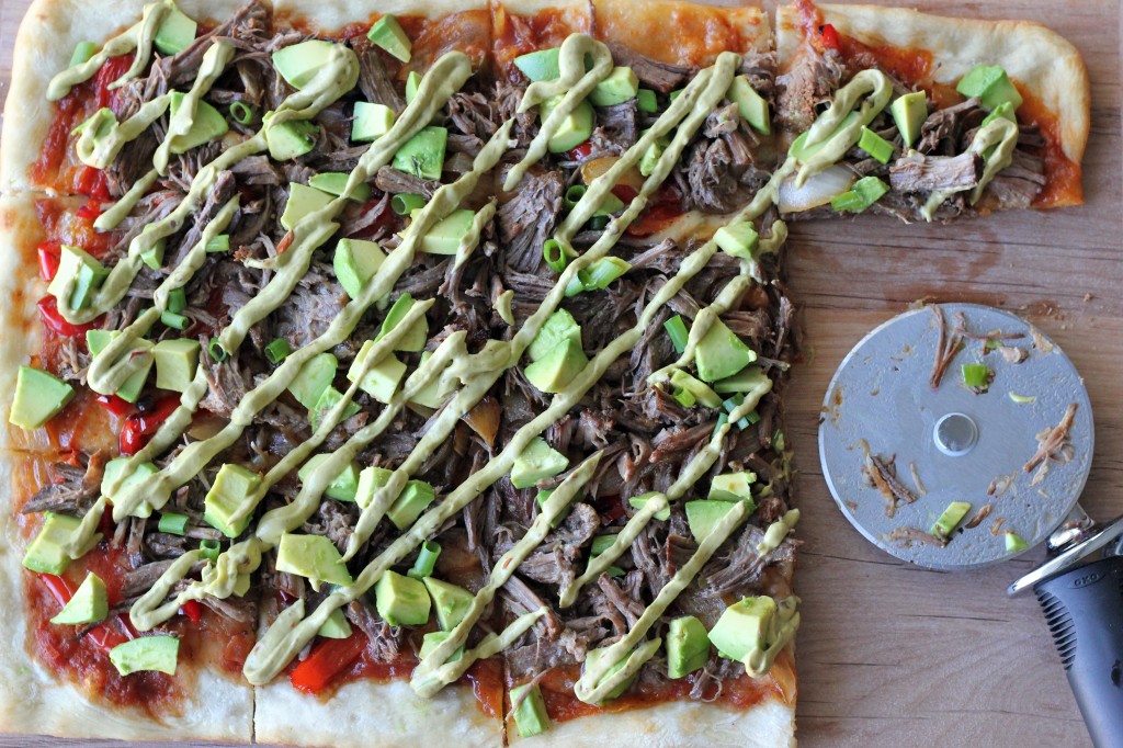 Carnitas Avocado Pizza - Pizza was meant to be smothered in slow-cooked, tender carnitas and drizzled with chipotle avocado mayo!