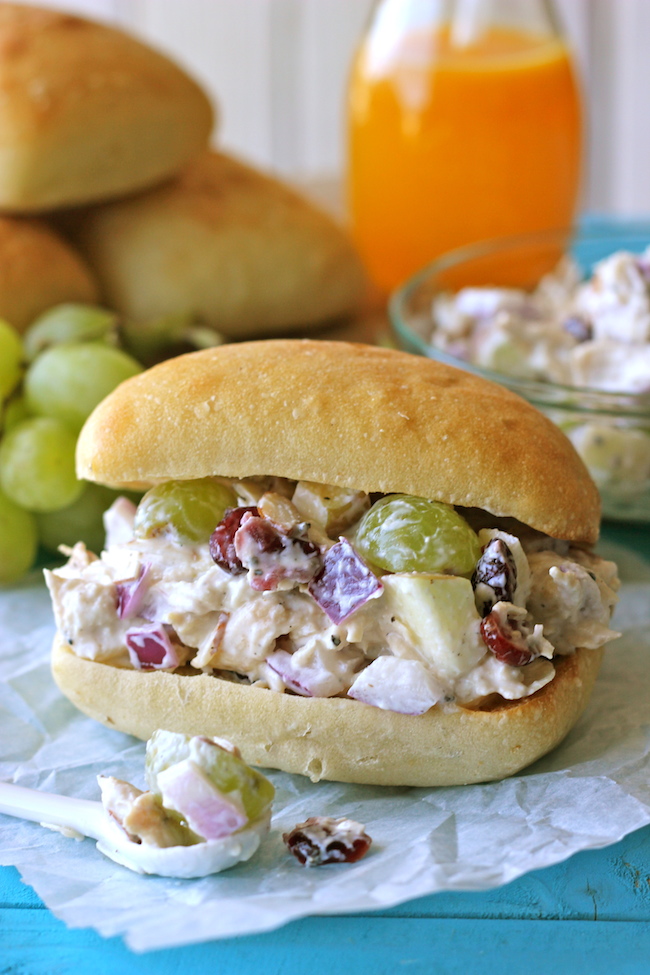 Greek Yogurt Chicken Salad Sandwich - From the plump grapes to the sweet cranberries, this lightened up sandwich won't even taste healthy!