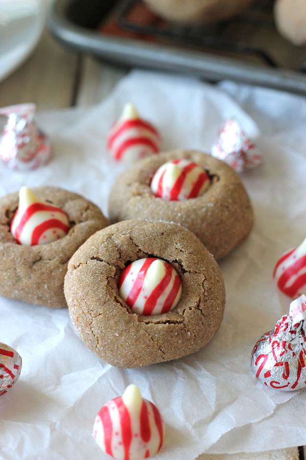 Peppermint Mocha Blossoms - These blossoms are the perfect holiday cookie, especially when they're topped with a candy cane Hershey's Kiss!