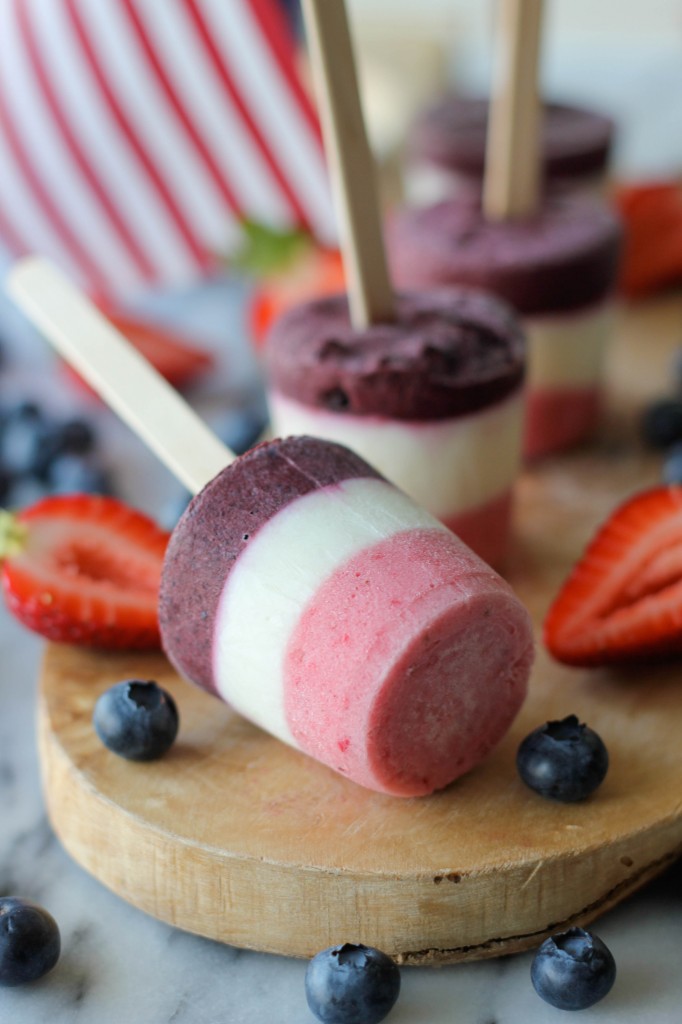 Greek Yogurt Popsicles - Red, white and blue popsicles that are completely nutritious and so refreshing in this summer heat!