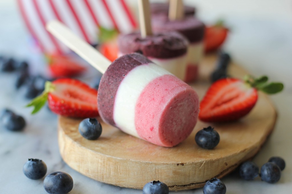 Greek Yogurt Popsicles - Red, white and blue popsicles that are completely nutritious and so refreshing in this summer heat!