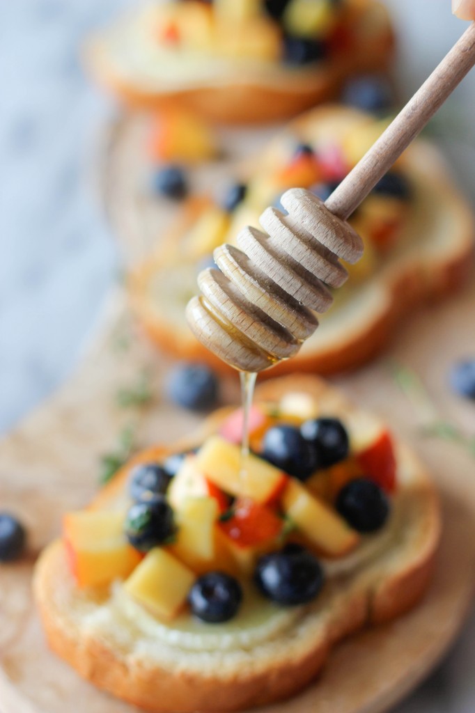 Goat Cheese Crostini with Blueberry and Peach Thyme Salsa - The flavors of summer come together for an elegant appetizer.