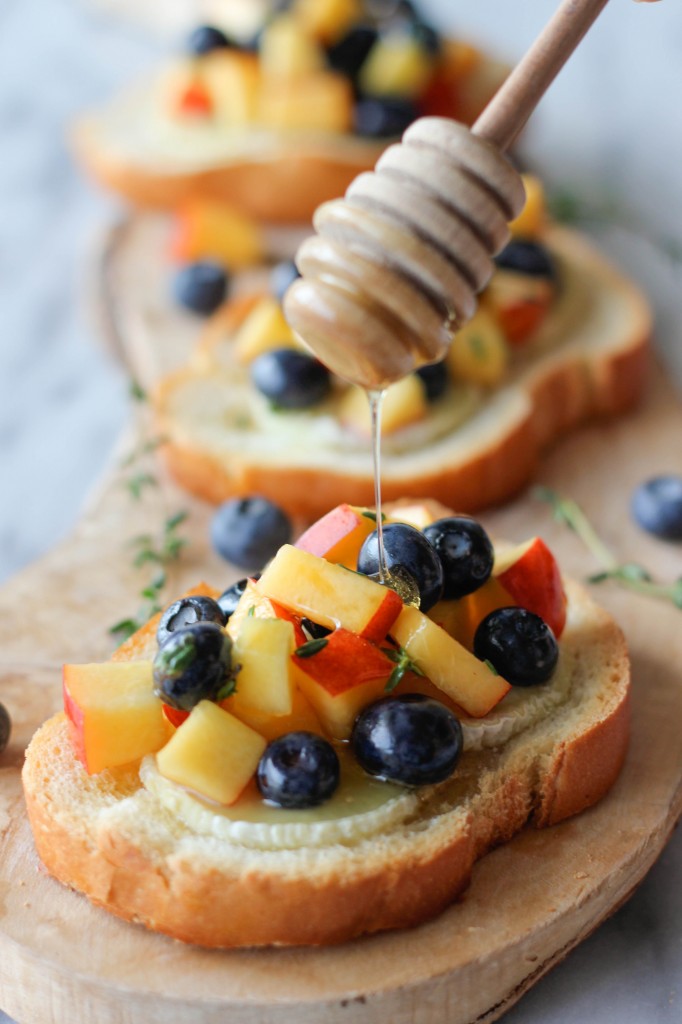 Goat Cheese Crostini with Blueberry and Peach Thyme Salsa - The flavors of summer come together for an elegant appetizer.