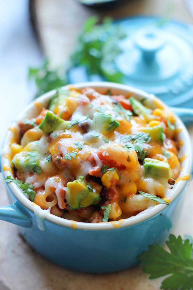 One Pot Mexican Skillet Pasta - This Mexican-inspired pasta dish can be made in 30 minutes or less. Even the pasta gets cooked right in the pot!