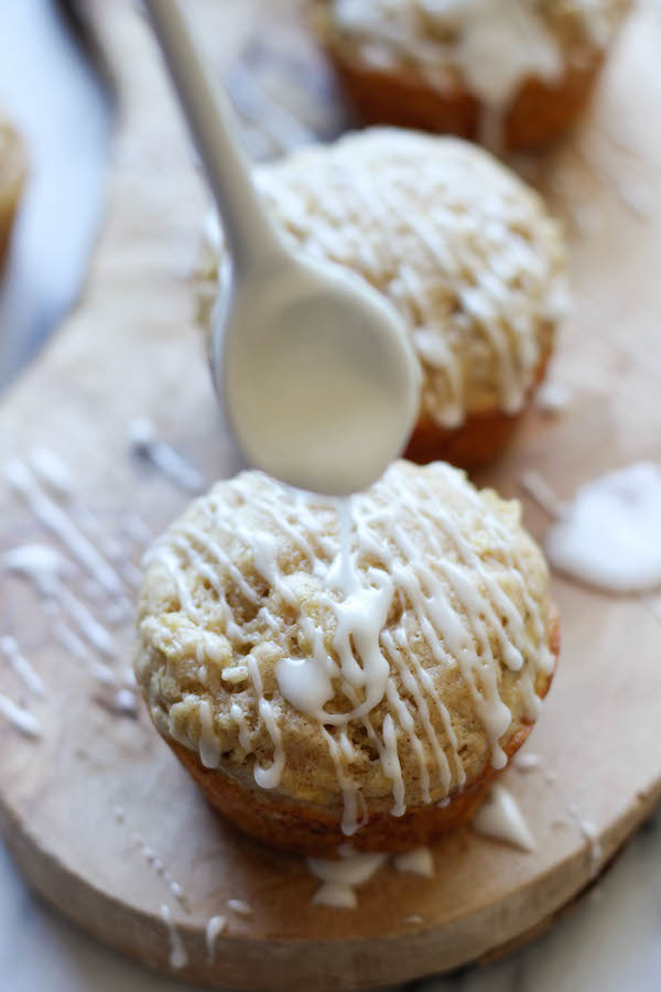 Vanilla Glazed Apple Cinnamon Muffins - Moist, fluffy muffins chockfull of apple cinnamon and finished with a vanilla glaze!