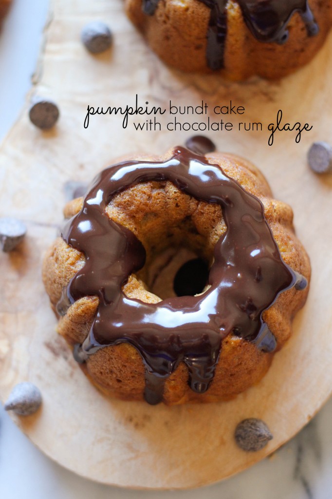 Pumpkin Bundt Cake with Chocolate Rum Glaze - Moist, fluffy mini pumpkin bundt cakes with a dripping boozy rum chocolate glaze!