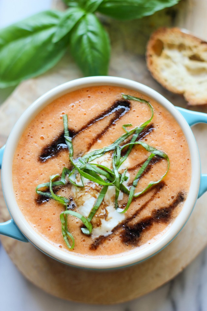 Caprese Tomato Soup - Served caprese-style with burrata, balsamic reduction, and fresh basil leaves!