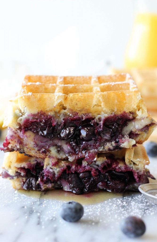 Brie and Blueberry Waffle Grilled Cheese - Two crisp buttermilk waffles sandwiching a blueberry compote with melted brie – the perfect grilled cheese for breakfast!