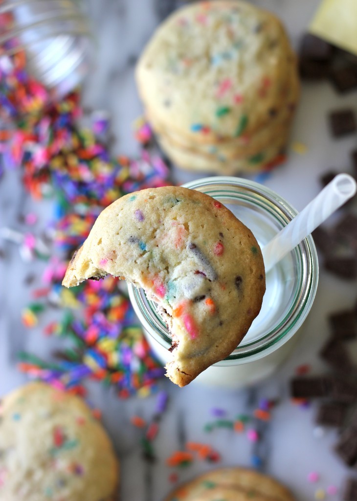 Funfetti Cookies with Chocolate Chunks - Cakey cookies with chocolate chunks and rainbow jimmie sprinkles!
