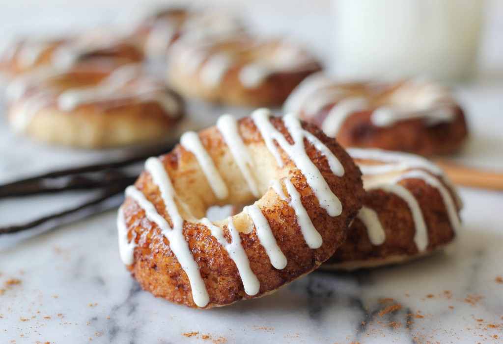 Greek Yogurt Cinnamon Roll Donuts - Cinnamon roll in donut form, lightened up with Greek yogurt so you could eat these guilt-free!