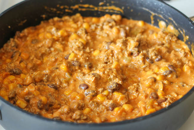 Enchilada Pasta - All the flavors of cheesy enchiladas are tossed together in this quick and easy pasta dish!