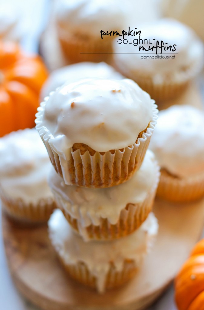 Pumpkin Doughnut Muffins - An irresistible pumpkin doughnut muffin hybrid smothered with a dripping vanilla glaze!