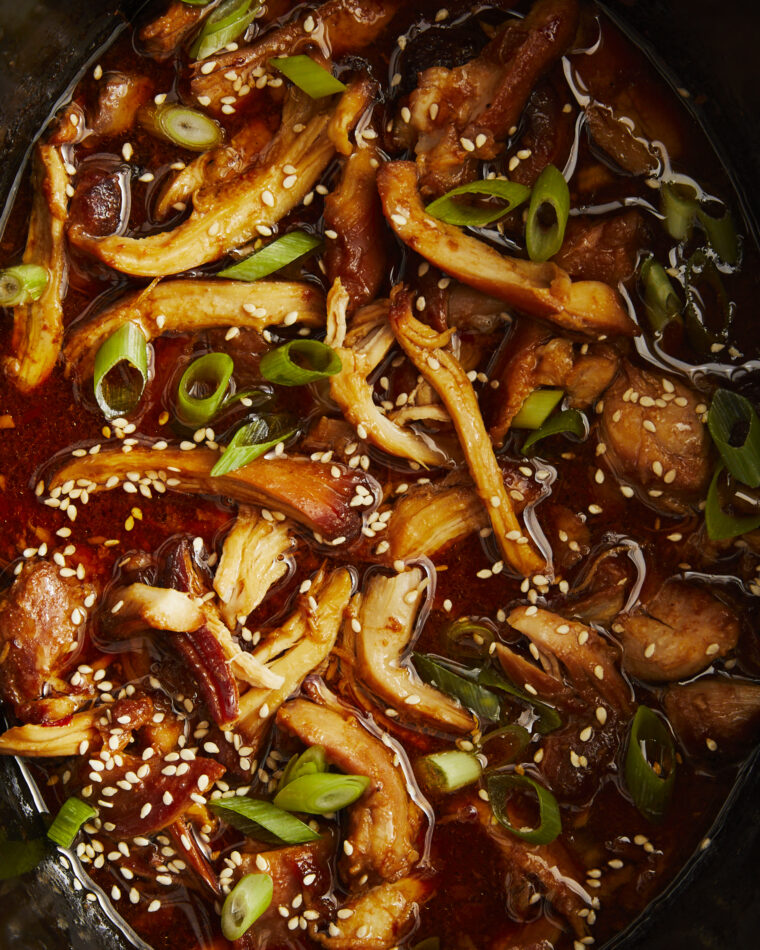 Slow Cooker Honey Sesame Chicken - Dump everything in the crockpot for a family-friendly meal! Best served over rice. Sweet, savory & so easy. 