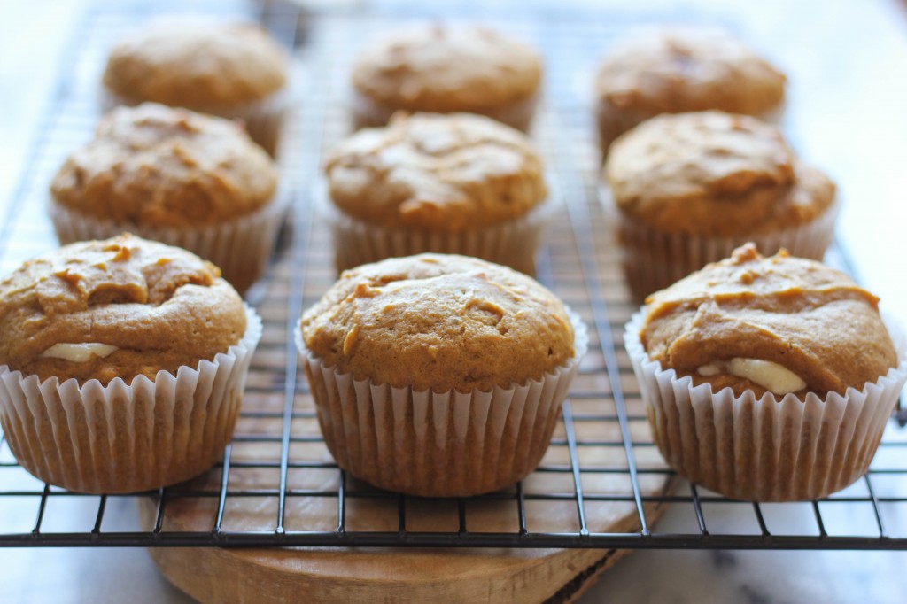 Pumpkin Cheesecake Cupcakes - With a surprise cheesecake filling and graham cracker crumb topping, these are sure to impress your guests!