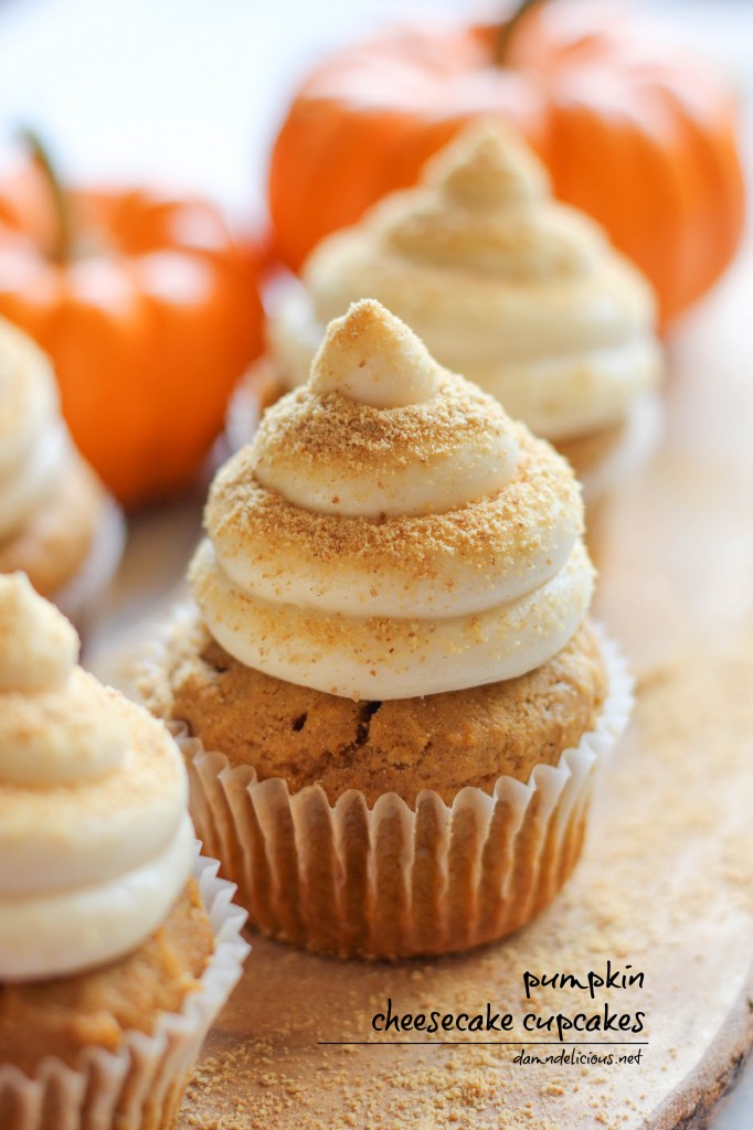 Pumpkin Cheesecake Cupcakes - With a surprise cheesecake filling and graham cracker crumb topping, these are sure to impress your guests!