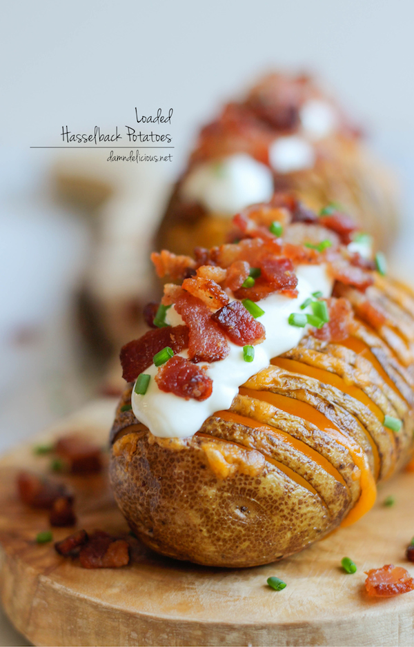 Loaded Hasselback Potatoes - A glorified baked potato loaded with melted cheddar cheese, sour cream, and crisp bacon bits!