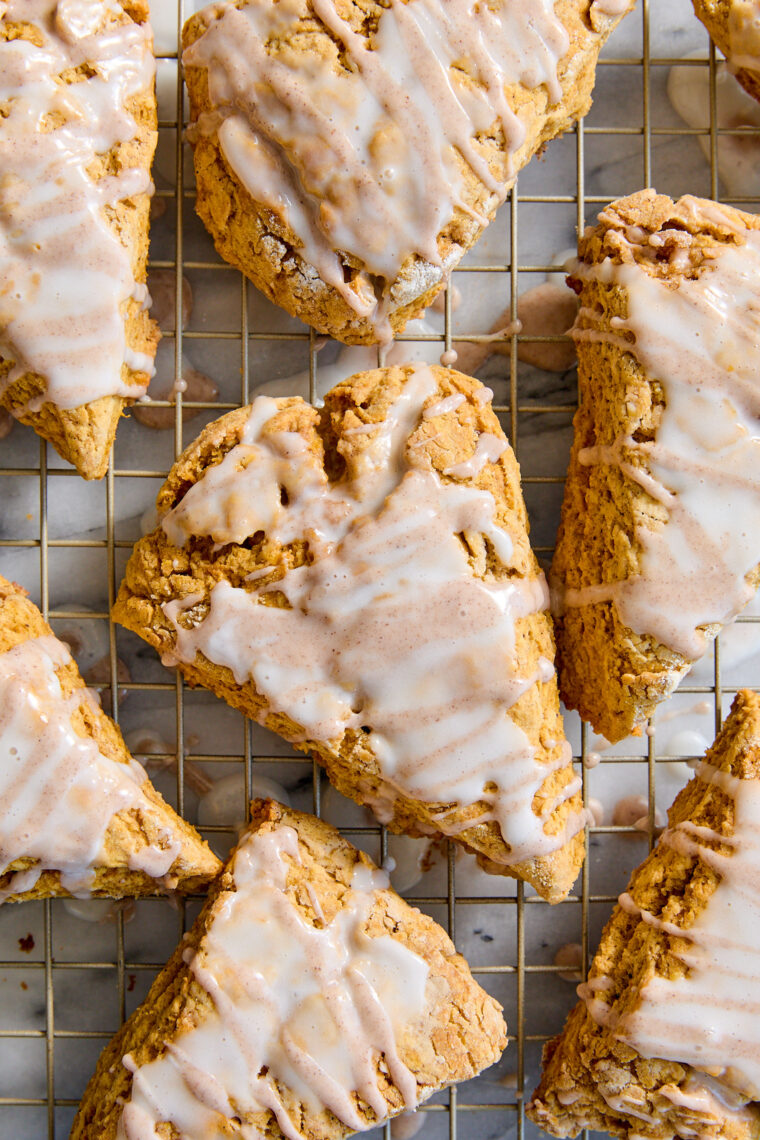 Starbucks Pumpkin Scones Copycat Recipe - Incredibly easy to make and even tastier than Starbucks! And that drizzle of glaze on top, SO GOOD!