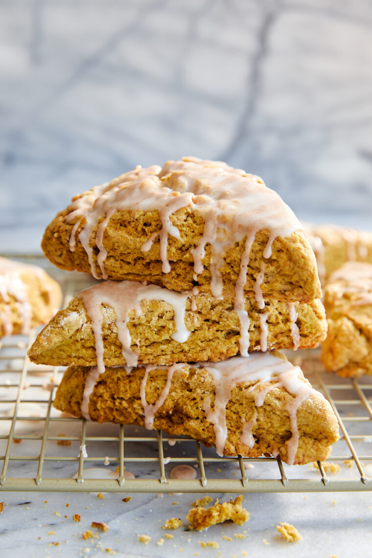 Starbucks Pumpkin Scones Copycat Recipe - Incredibly easy to make and even tastier than Starbucks! And that drizzle of glaze on top, SO GOOD!