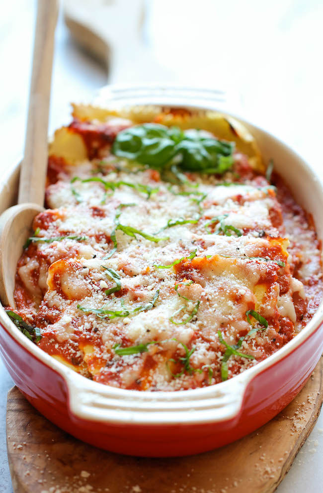 Baked Ravioli in dish with serving spoon