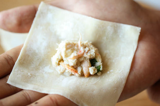 Crab Rangoon - This crisp, fried wonton is loaded with cream cheese and crab goodness, and it's an absolute party favorite!