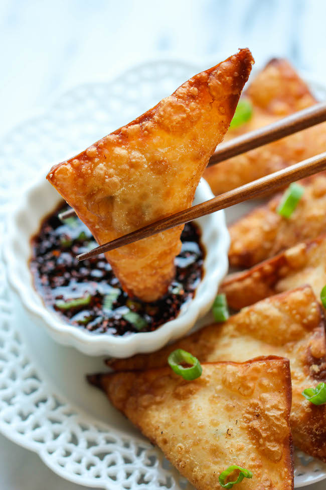 Crab Rangoon - This crisp, fried wonton is loaded with cream cheese and crab goodness, and it's an absolute party favorite!