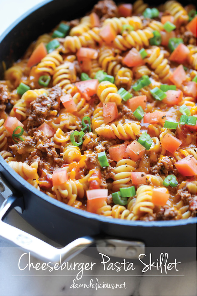 One Pot Cheeseburger Casserole - This cheesy goodness comes together so easily in one skillet. Even the pasta gets cooked right in the pan!