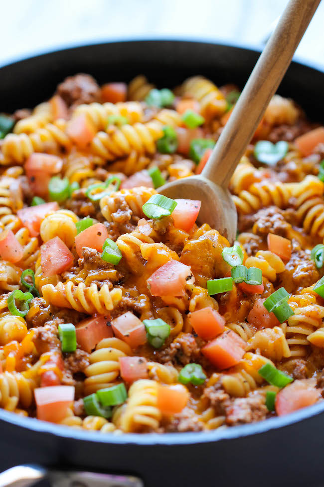 One Pot Cheeseburger Casserole - This cheesy goodness comes together so easily in one skillet. Even the pasta gets cooked right in the pan!