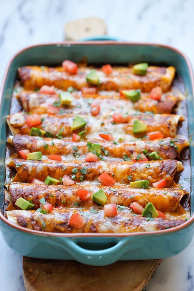 Beef Enchiladas - Loaded with a simple and hearty crumbled beef filling, these cheesy enchiladas will be on your dinner table in no time!