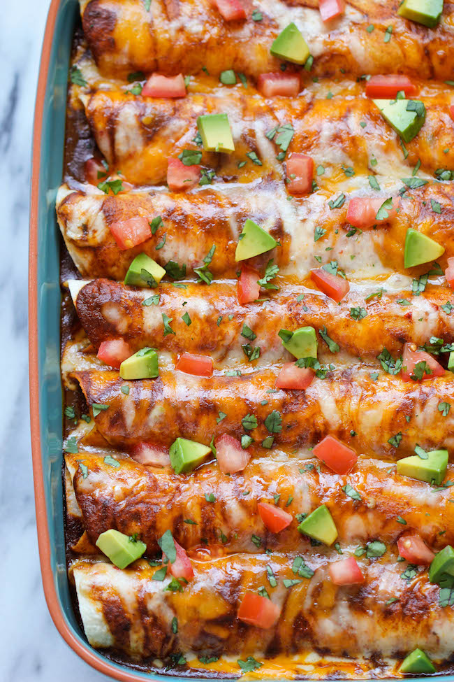 Beef Enchiladas - Loaded with a simple and hearty crumbled beef filling, these cheesy enchiladas will be on your dinner table in no time!