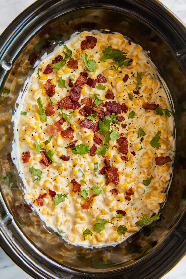 Slow Cooker Corn and Jalapeño Dip - The creamiest, easiest dip ever! Perfect for big family gatherings + game day. A huge crowd-pleaser, too!