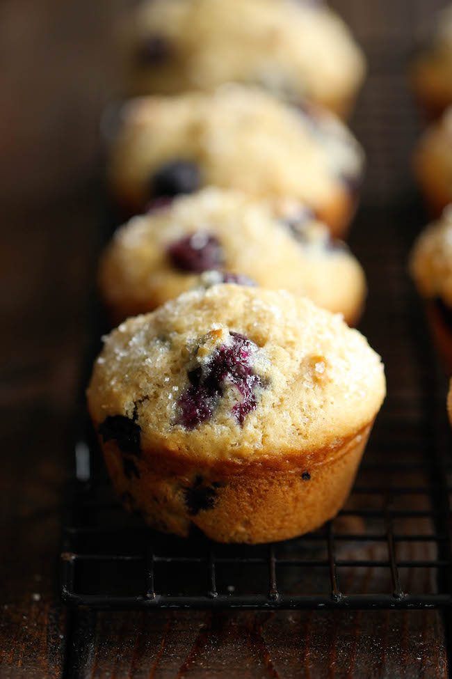 Blueberry Vanilla Muffins - These light and airy muffins are loaded with juicy blueberries and extra vanilla goodness!