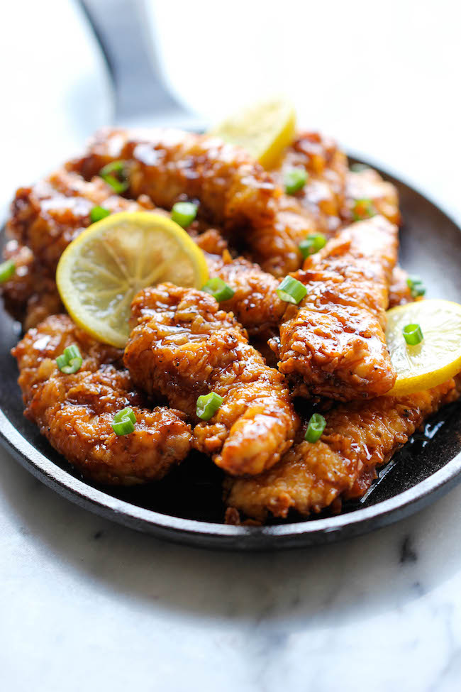 Asian Lemon Chicken Tenders - A wonderful asian twist to your favorite chicken tenders, tossed in the most heavenly sweet, lemon glaze!