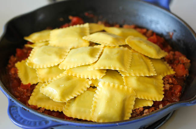 Ravioli and Italian Sausage Skillet - Cheesy comfort food at its best made in less than 30 min. You can't beat that!