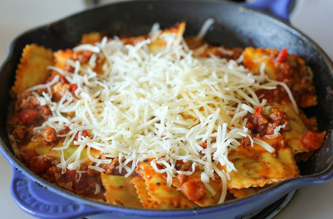 Ravioli and Italian Sausage Skillet - Cheesy comfort food at its best made in less than 30 min. You can't beat that!