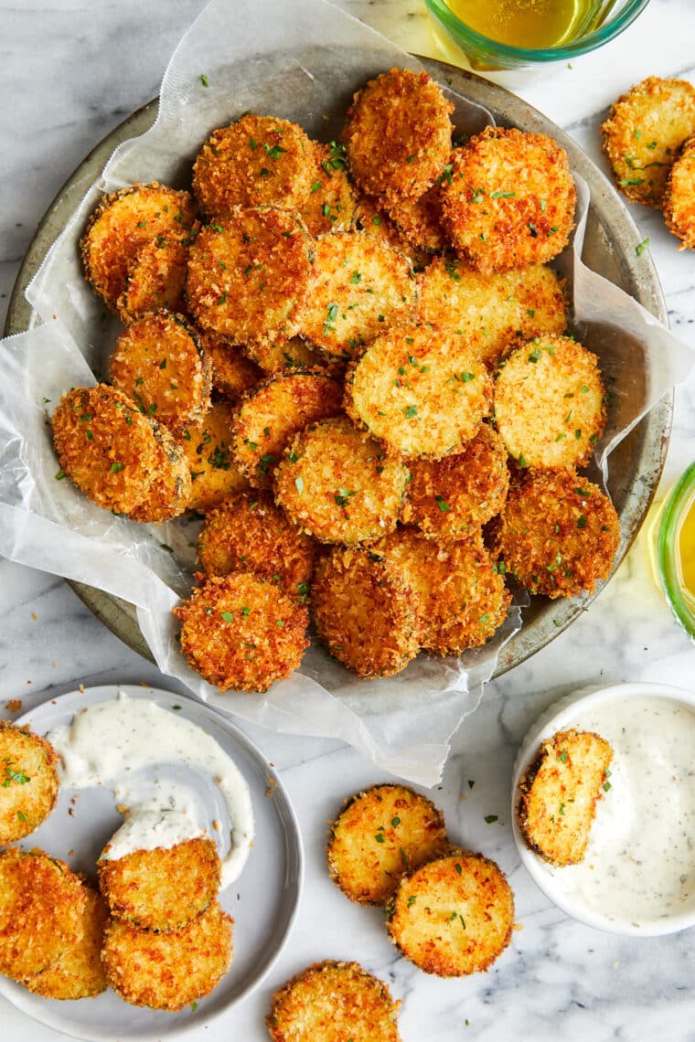 Zucchini Parmesan Crisps - Perfectly golden brown parmesan-crusted zucchini slices (to use up all that summer zucchini!). So crispy, so good!