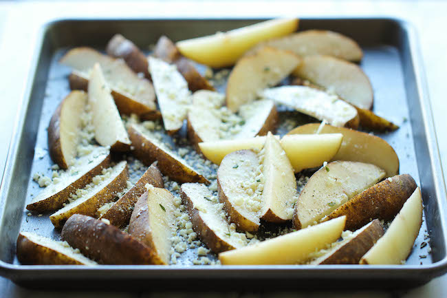 Garlic Parmesan Fries - Amazingly crisp, oven-baked fries coated with freshly grated Parmesan and a generous dose of garlic goodness!