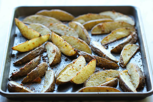 Garlic Parmesan Fries - Amazingly crisp, oven-baked fries coated with freshly grated Parmesan and a generous dose of garlic goodness!