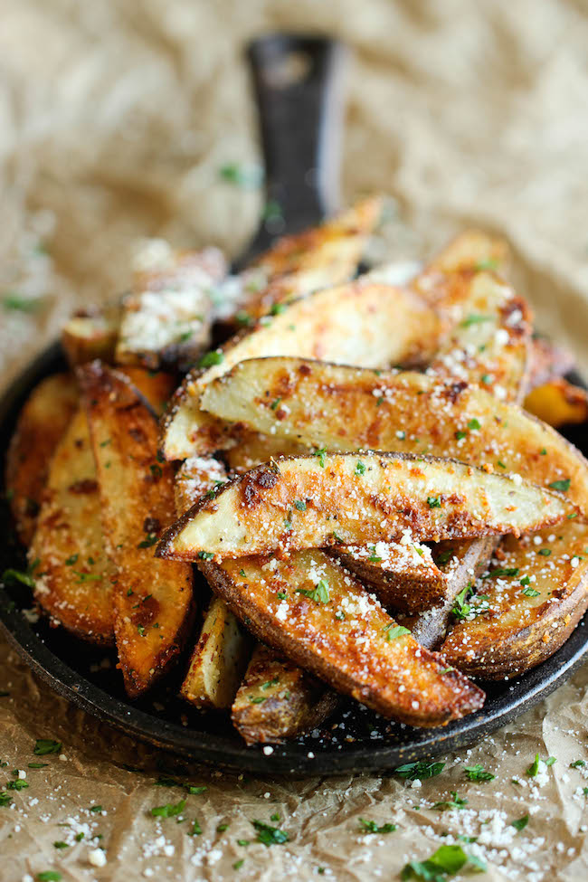 Garlic Parmesan Fries - Amazingly crisp, oven-baked fries coated with freshly grated Parmesan and a generous dose of garlic goodness!