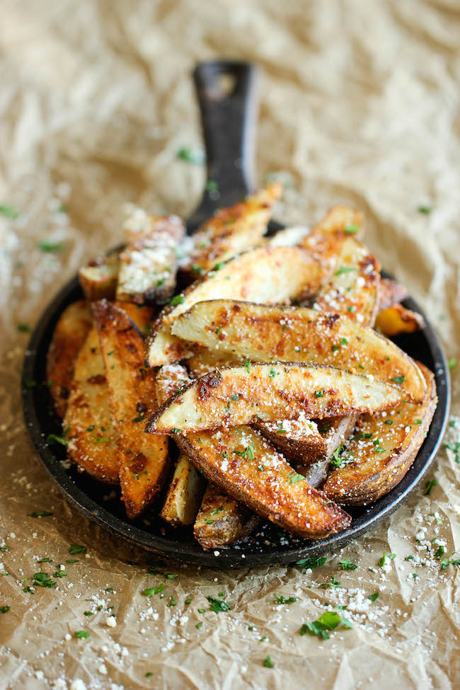 Garlic Parmesan Fries - Amazingly crisp, oven-baked fries coated with freshly grated Parmesan and a generous dose of garlic goodness!