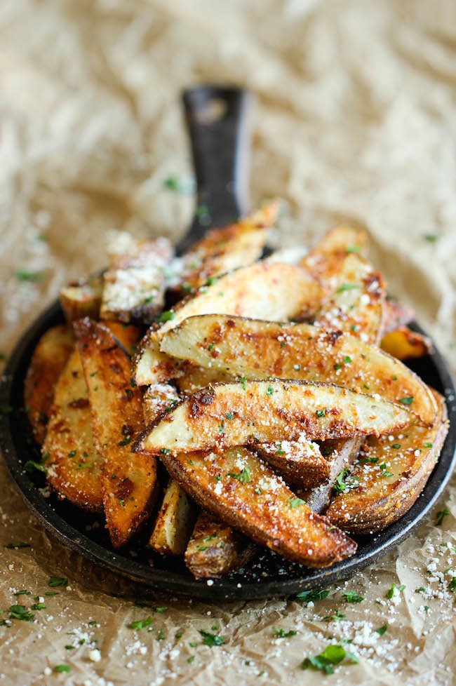 Garlic Parmesan Fries - Amazingly crisp, oven-baked fries coated with freshly grated Parmesan and a generous dose of garlic goodness!