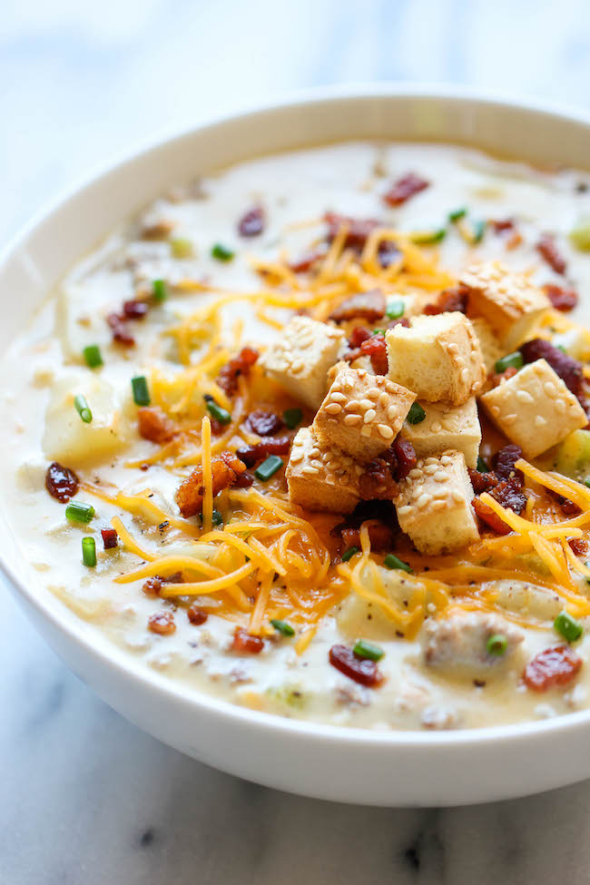 Cheeseburger Soup - All the flavors of a cheeseburger in a creamy, comforting soup, topped with crisp bacon and hamburger bun croutons!