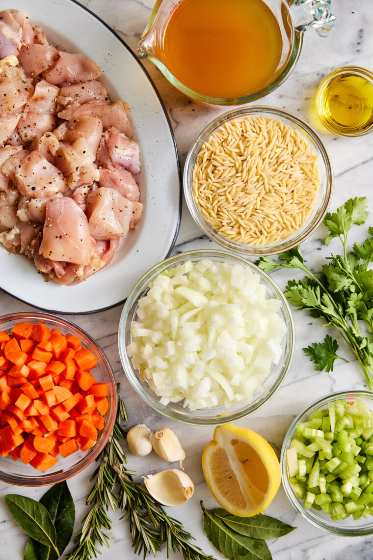 Lemon Chicken Orzo Soup - Chockfull of hearty veggies and tender chicken in a refreshing lemony broth. It is PURE COMFORT in a bowl!