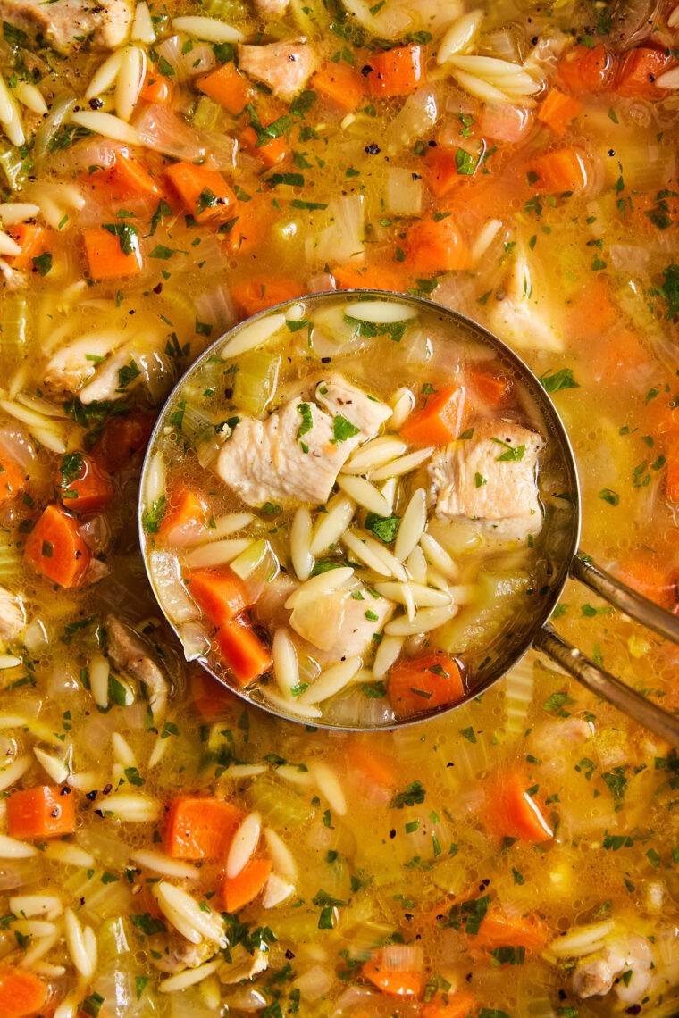 Lemon Chicken Orzo Soup - Chockfull of hearty veggies and tender chicken in a refreshing lemony broth. It is PURE COMFORT in a bowl!