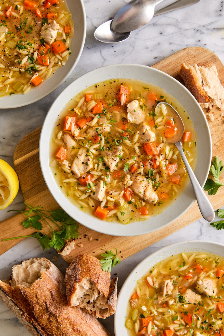 Lemon Chicken Orzo Soup - Chockfull of hearty veggies and tender chicken in a refreshing lemony broth. It is PURE COMFORT in a bowl!