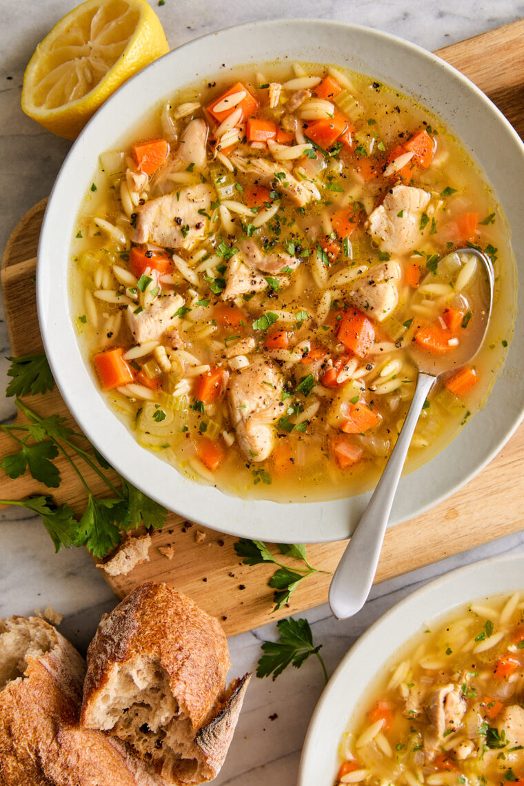 Lemon Chicken Orzo Soup - Chockfull of hearty veggies and tender chicken in a refreshing lemony broth. It is PURE COMFORT in a bowl!