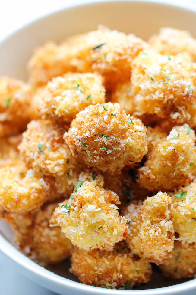 Parmesan Cauliflower Bites - Crisp, crunchy cauliflower bites that even the pickiest of eaters will love. Perfect as an appetizer or snack!